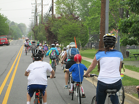 Students and their families take part in Bike Train on their way to Vienna Elementary School.